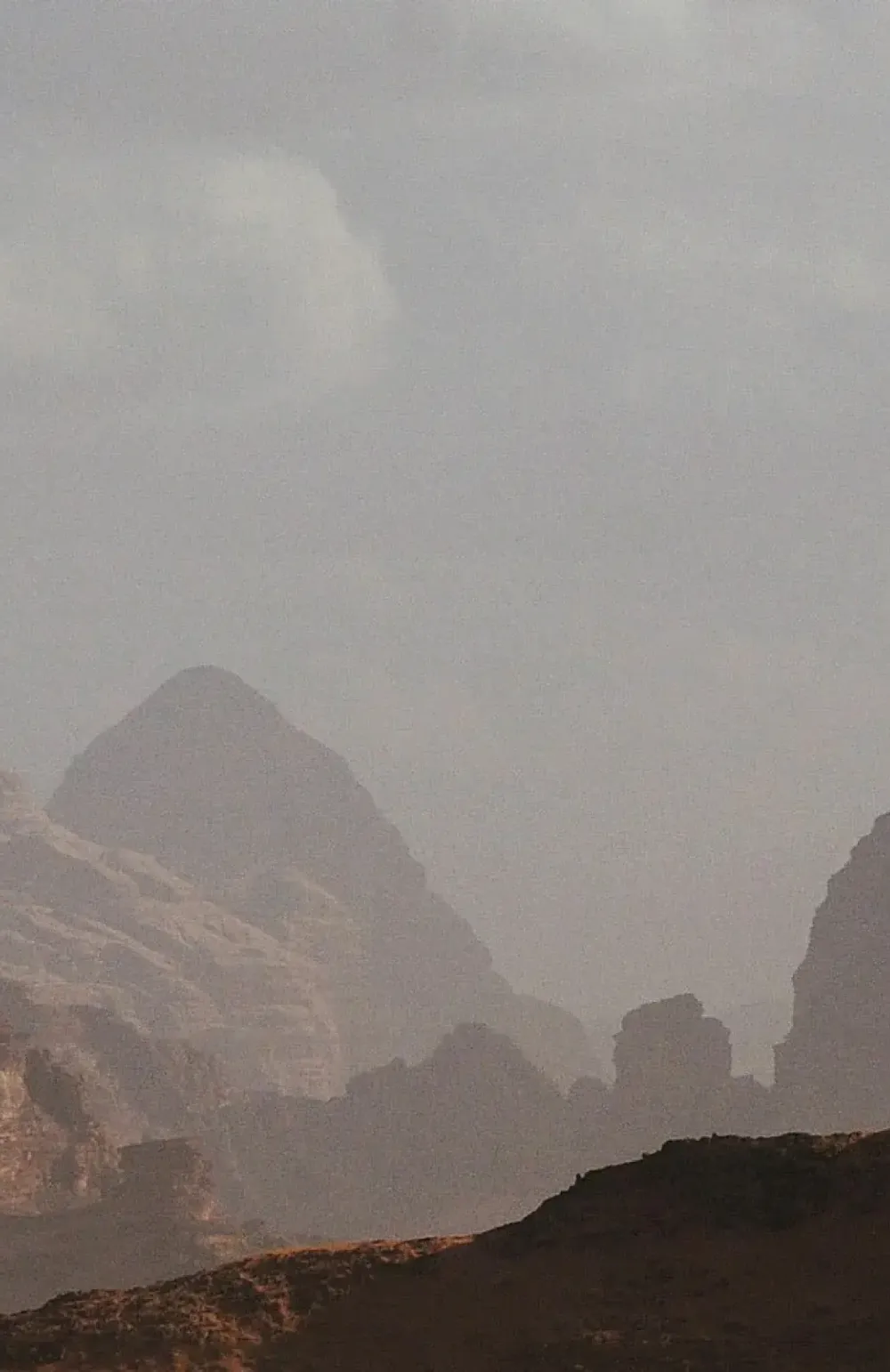 Misty red mountain range